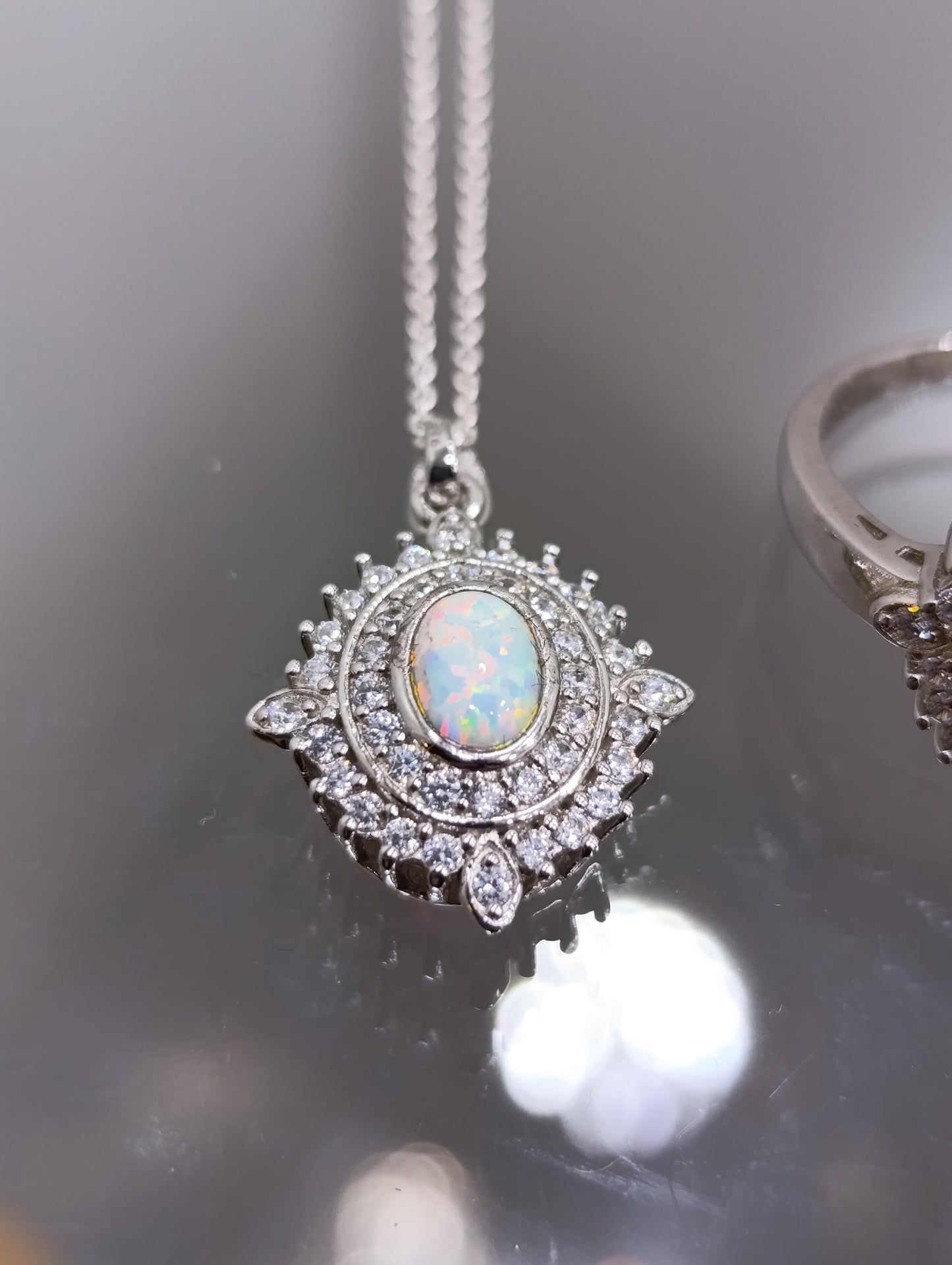 Sterling Silver Fire Opal Halo Ring and Necklace
