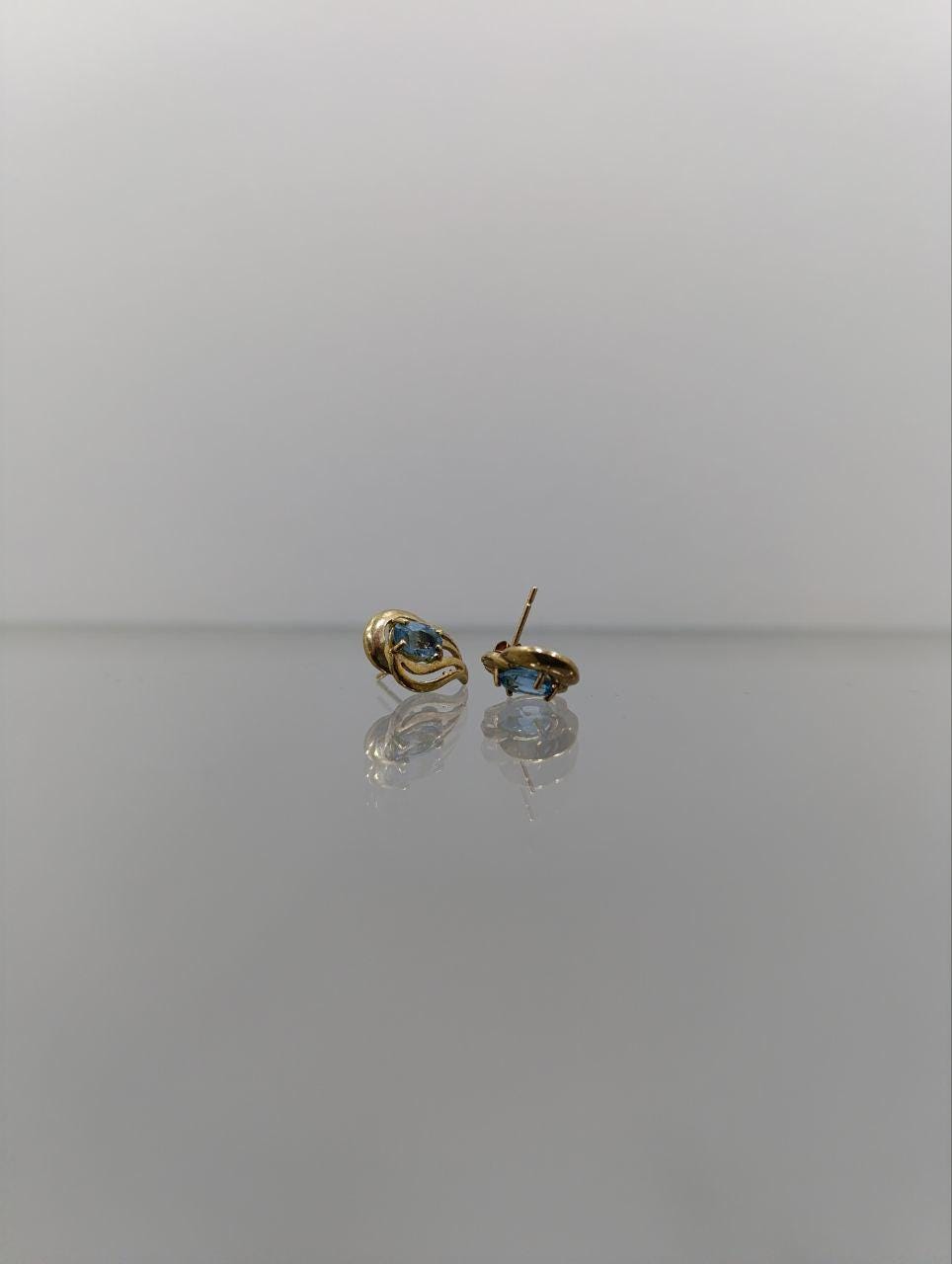 9ct Gold & Blue Topaz Stud Earrings - Elegant Flowing Design