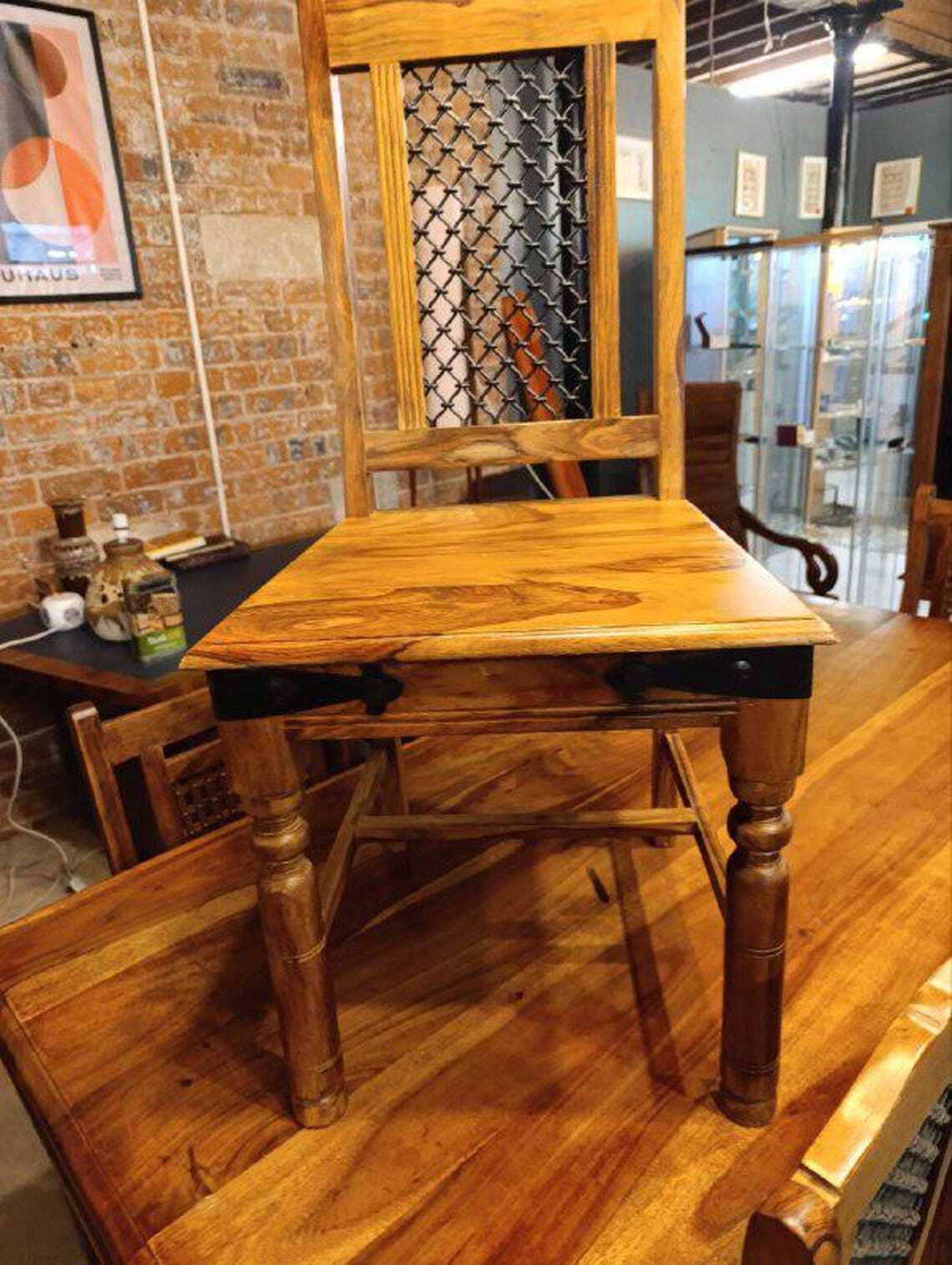 Hardwood Dining Table and Eight Chairs with Ironwork — photograph 16