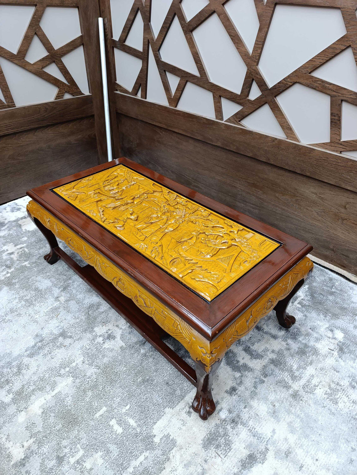 Chinoiserie Coffee Table with Carved Relief Panel — photograph 2