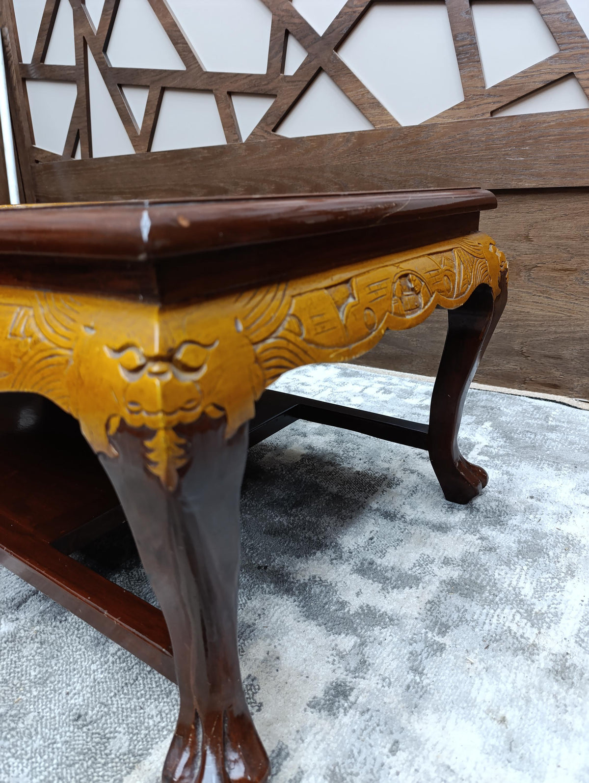 Chinoiserie Coffee Table with Carved Relief Panel — photograph 8