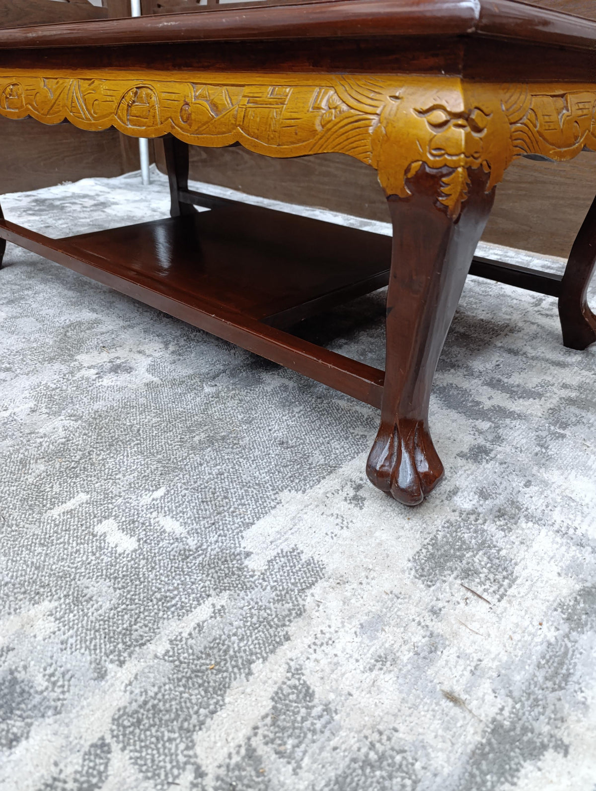 Chinoiserie Coffee Table with Carved Relief Panel — photograph 7