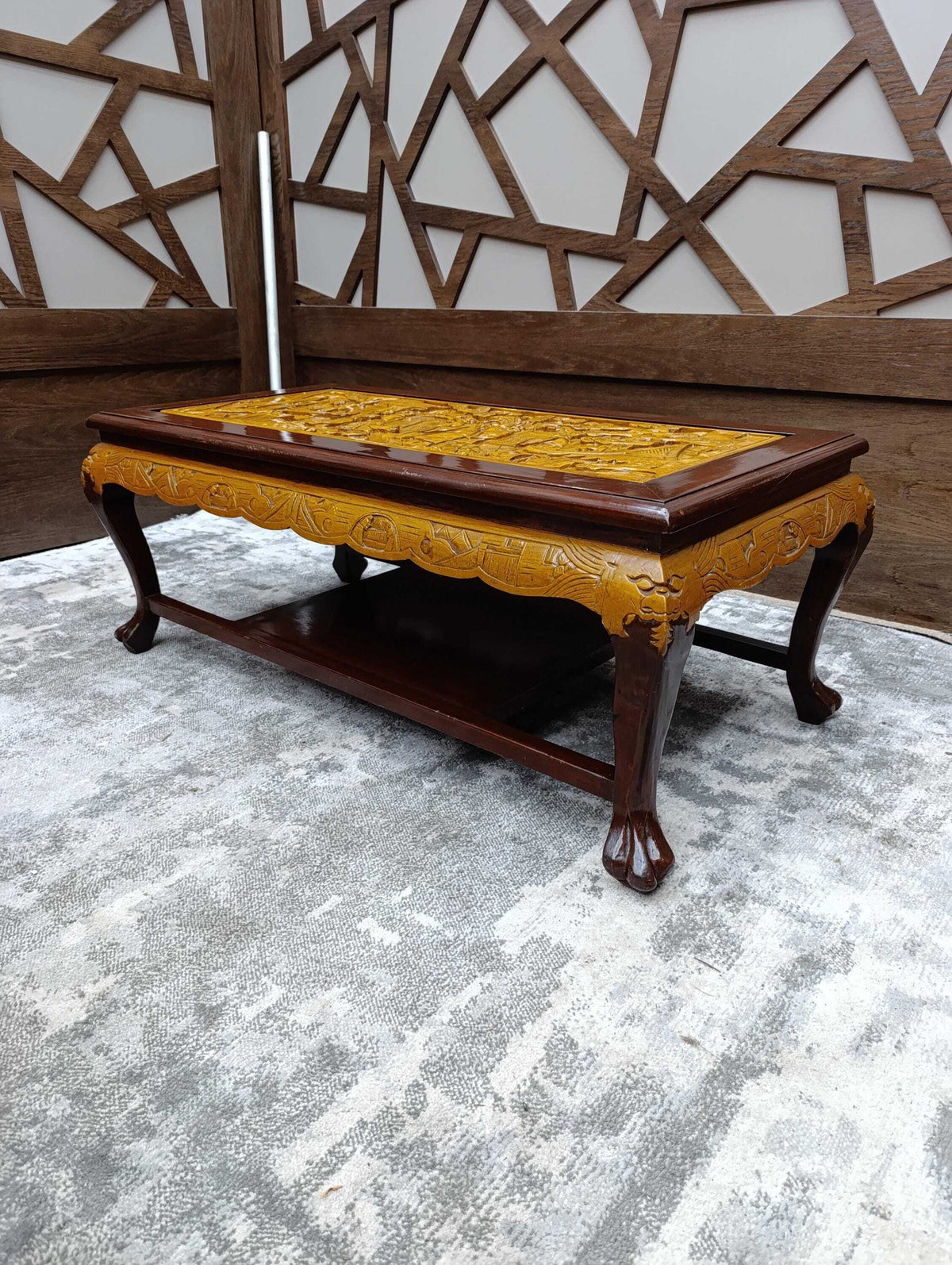 Chinoiserie Coffee Table with Carved Relief Panel — photograph 1