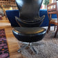Egg-Style Swivel Chair and Footstool in Black Leather — photograph 3