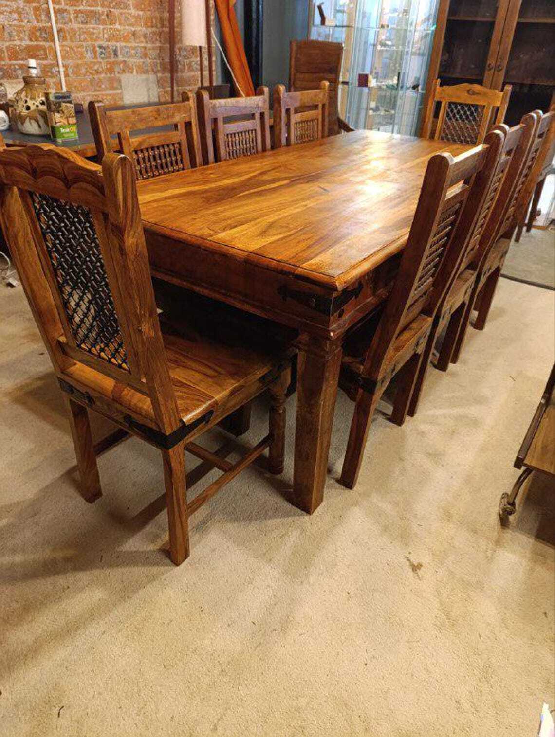 Hardwood Dining Table and Eight Chairs with Ironwork — photograph 1