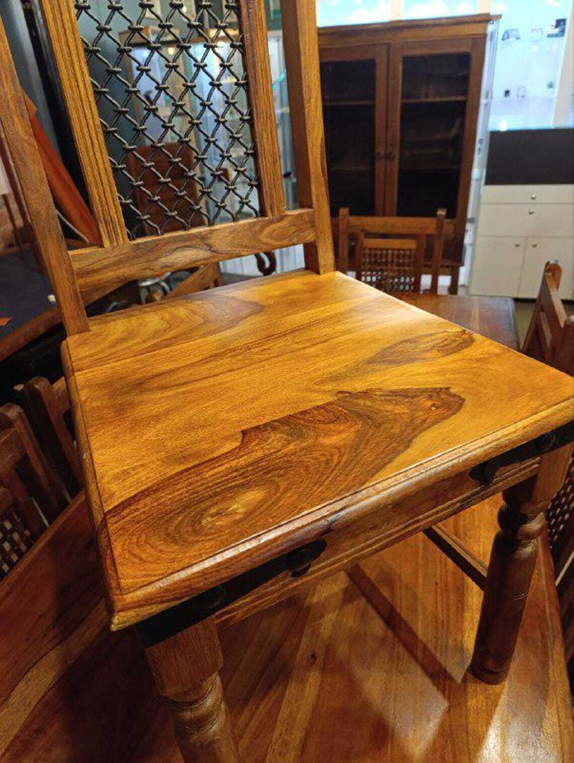 Hardwood Dining Table and Eight Chairs with Ironwork — photograph 13