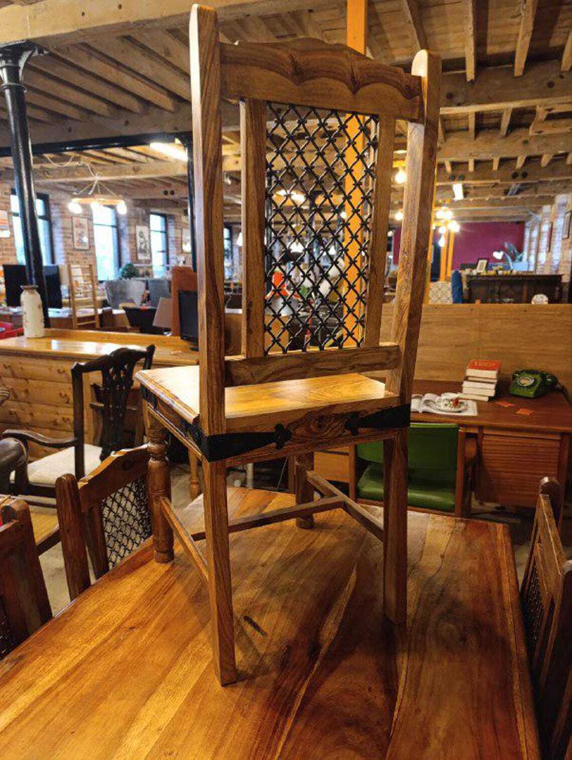 Hardwood Dining Table and Eight Chairs with Ironwork — photograph 11