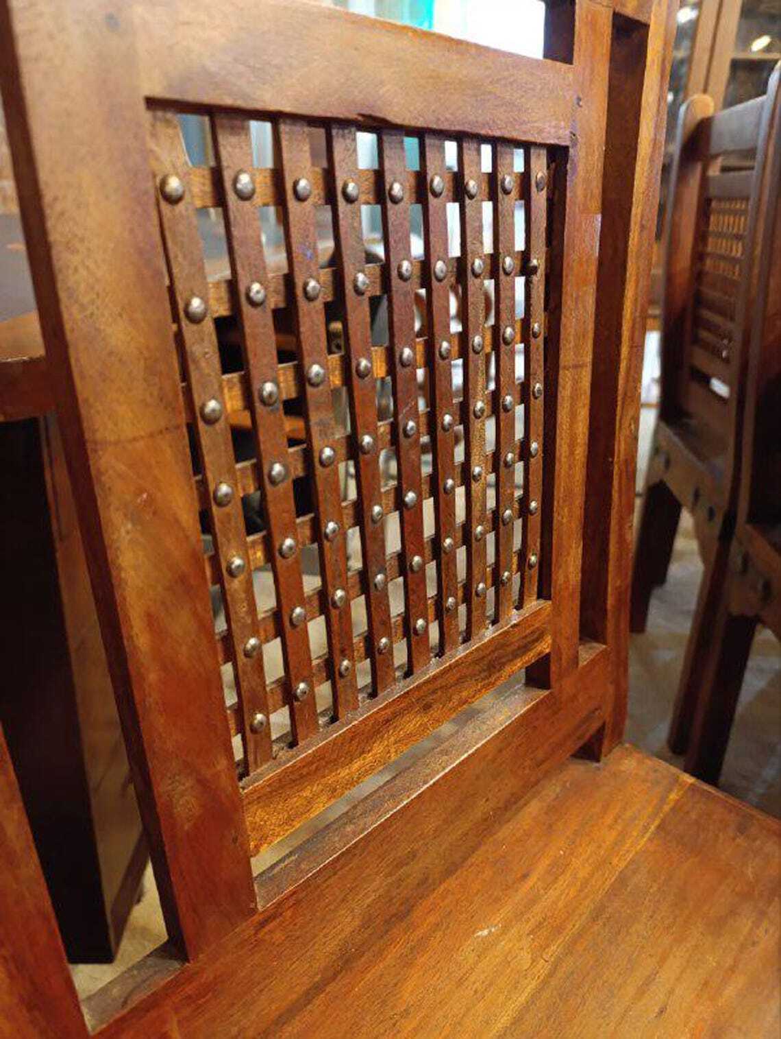 Hardwood Dining Table and Eight Chairs with Ironwork — photograph 9
