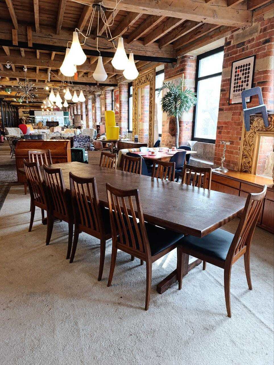 Danish Walnut and Rosewood Dining Table with Ten G Plan Chairs — photograph 1