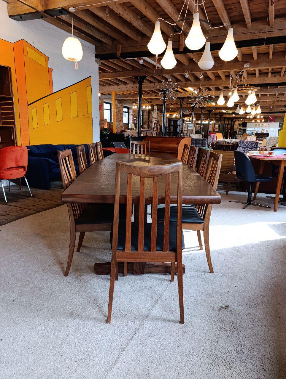 Danish Walnut and Rosewood Dining Table with Ten G Plan Chairs — photograph 4