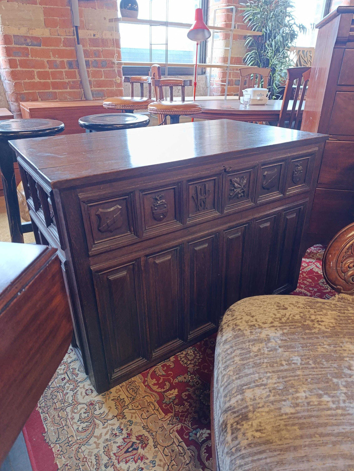 Tudor Revival Oak Coffer with Heraldic Carving — photograph 4