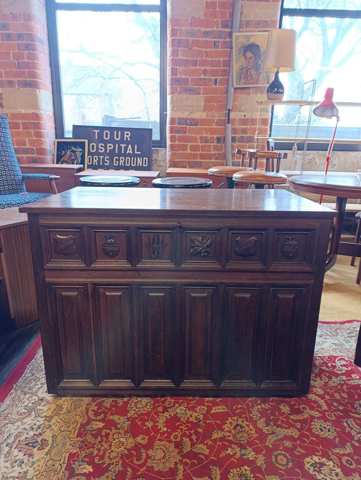 Tudor Revival Oak Coffer with Heraldic Carving — photograph 1