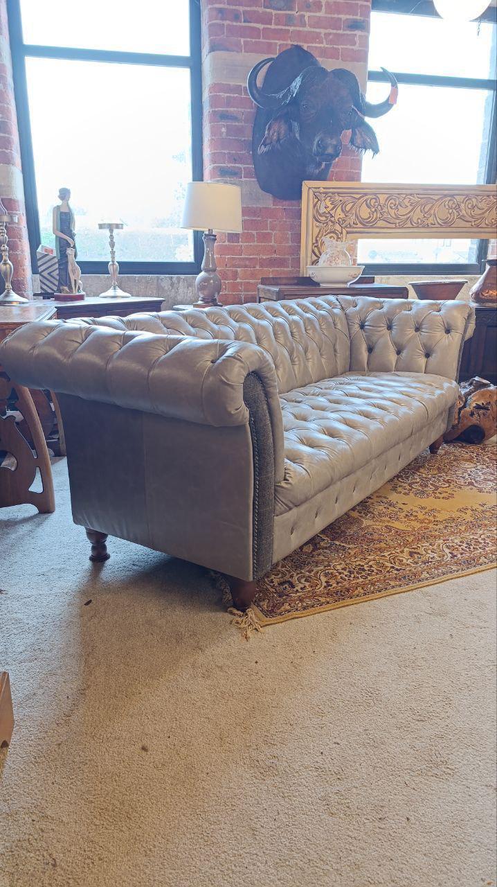 Grey Leather Chesterfield-Style Sofa — photograph 2