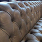 Grey Leather Chesterfield-Style Sofa — photograph 9